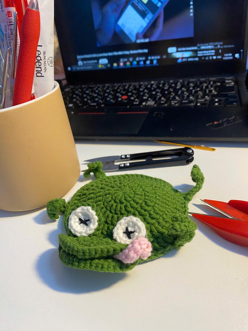 Gehäkelter Frosch-Tassenuntersetzer, grüner Pop-up-Tieruntersetzer