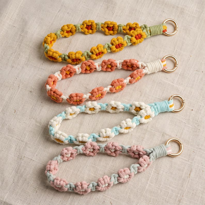 Gehäkeltes Gänseblümchen-Handyarmband mit O-Ring-Verschluss, 20 cm Länge