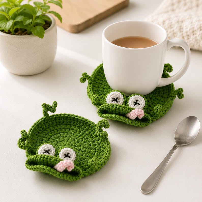 Gehäkelter Frosch-Tassenuntersetzer, grüner Pop-up-Tieruntersetzer