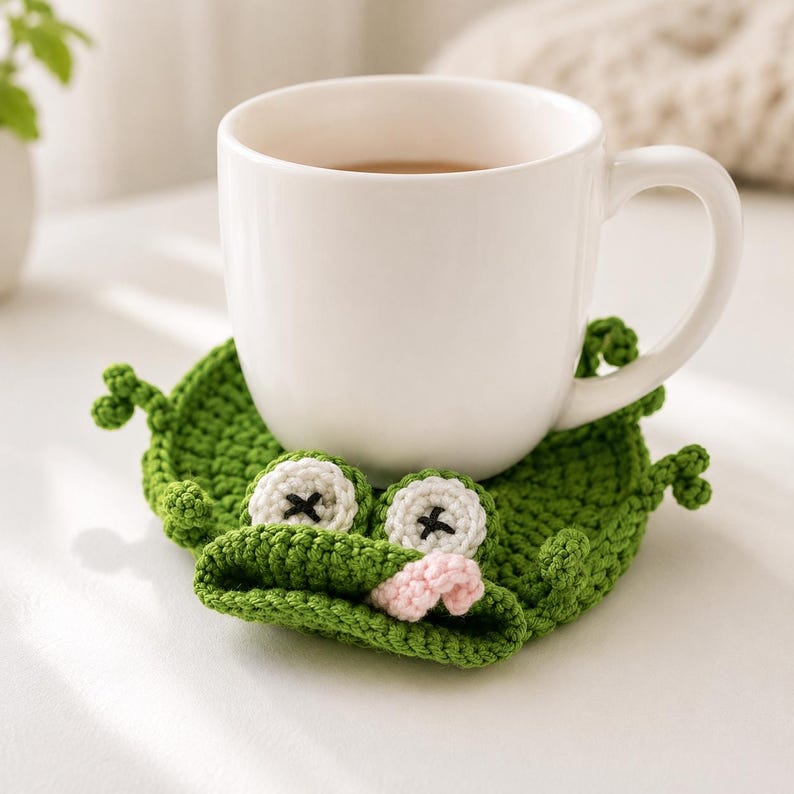 Gehäkelter Frosch-Tassenuntersetzer, grüner Pop-up-Tieruntersetzer