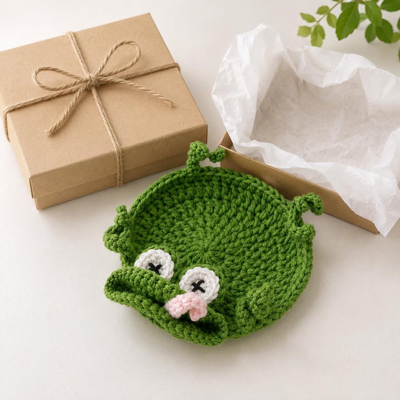 Gehäkelter Frosch-Tassenuntersetzer, grüner Pop-up-Tieruntersetzer