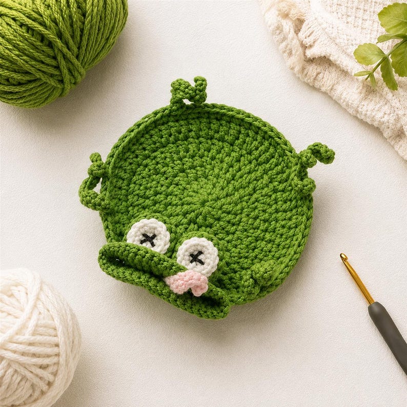 Gehäkelter Frosch-Tassenuntersetzer, grüner Pop-up-Tieruntersetzer