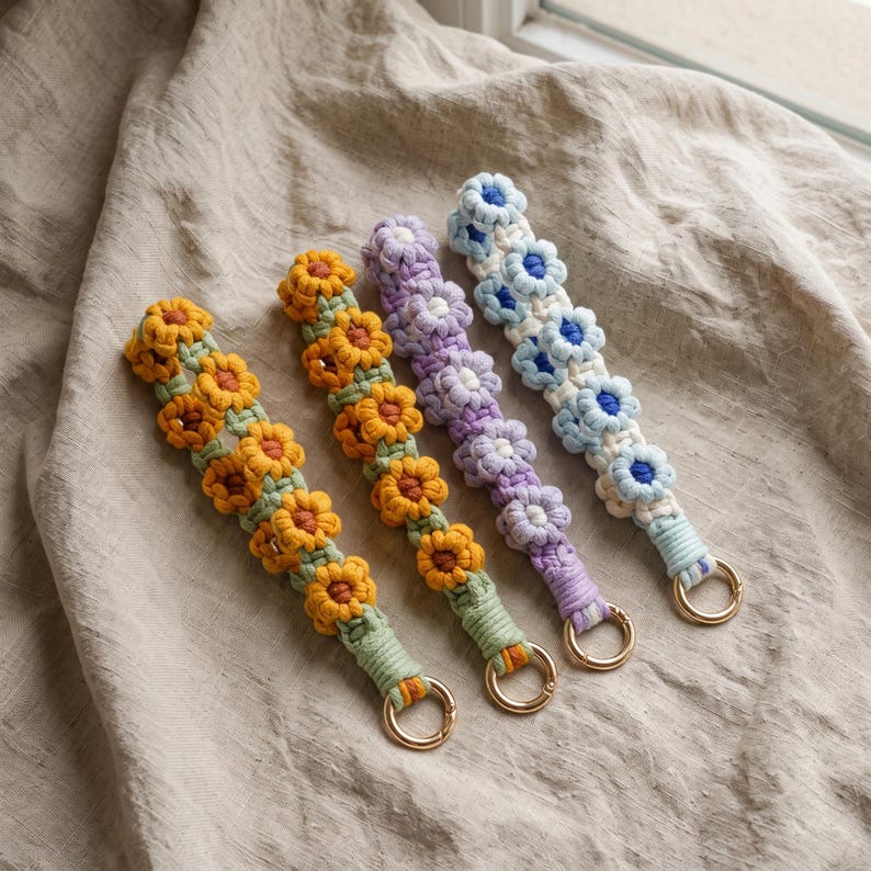 Gehäkeltes Gänseblümchen-Handyarmband mit O-Ring-Verschluss, 20 cm Länge
