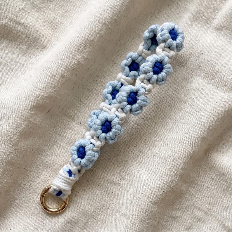 Gehäkeltes Gänseblümchen-Handyarmband mit O-Ring-Verschluss, 20 cm Länge