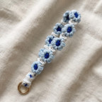 Gehäkeltes Gänseblümchen-Handyarmband mit O-Ring-Verschluss, 20 cm Länge